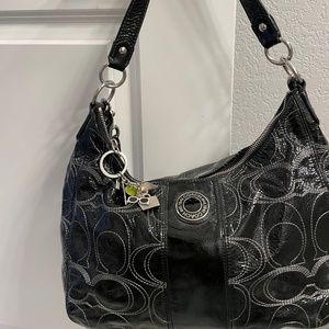 Coach crossbody purse with shoulder strap and coach keychain